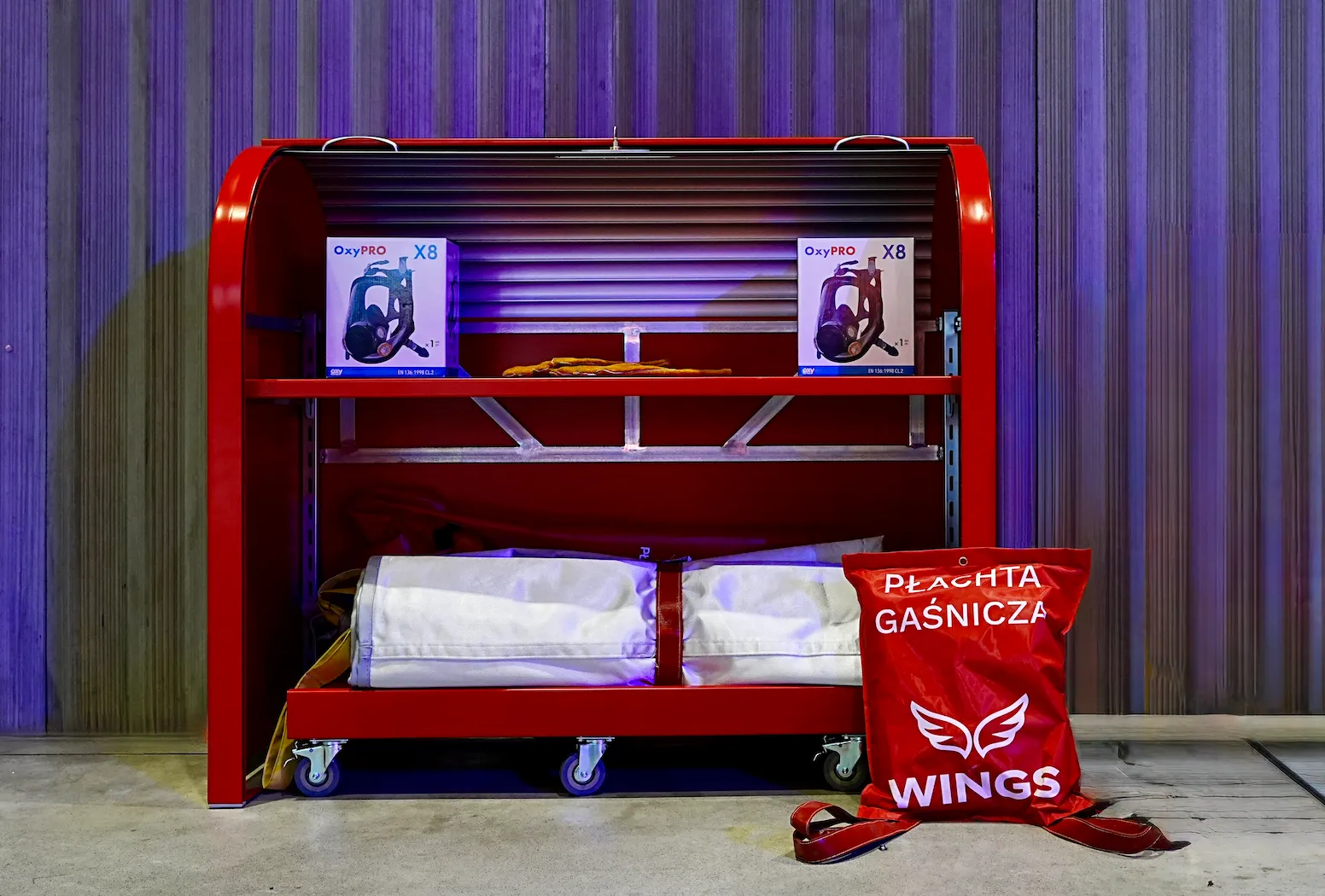 Red WINGS fire kit cabinet with protective masks, fire blanket and carry bag